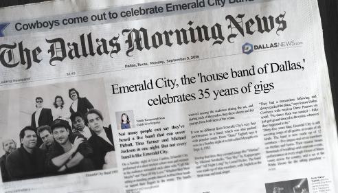 The Dallas Morning News front page with a band photo and article headline about Emerald City.