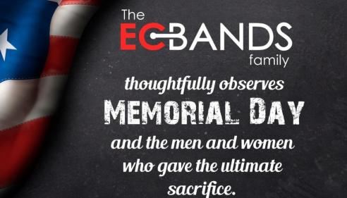 American flag next to Memorial Day tribute text on a dark background.