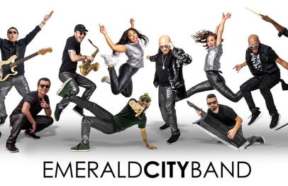 Emerald City Band members jumping and playing