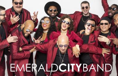 Emerald City Band members in red suits