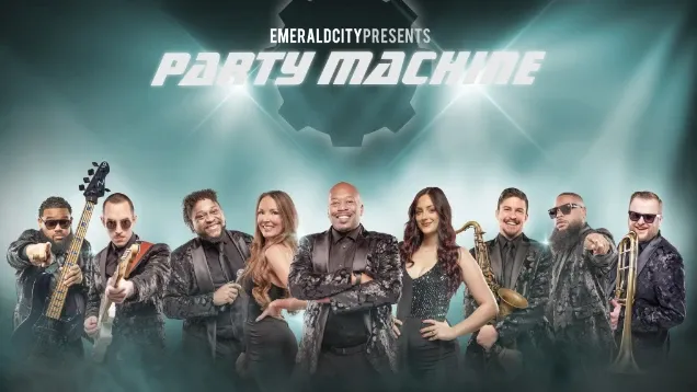 Eight musicians in black outfits pose under bright lights with instruments and microphones.